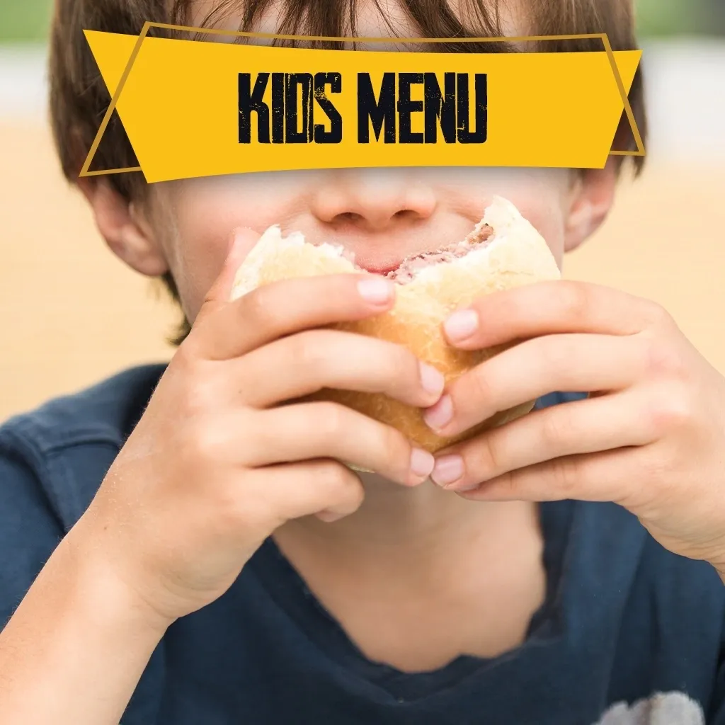 A kid eating a burger with both hands