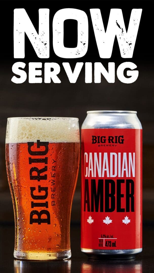 A can of canadian amber beer next to a glass.